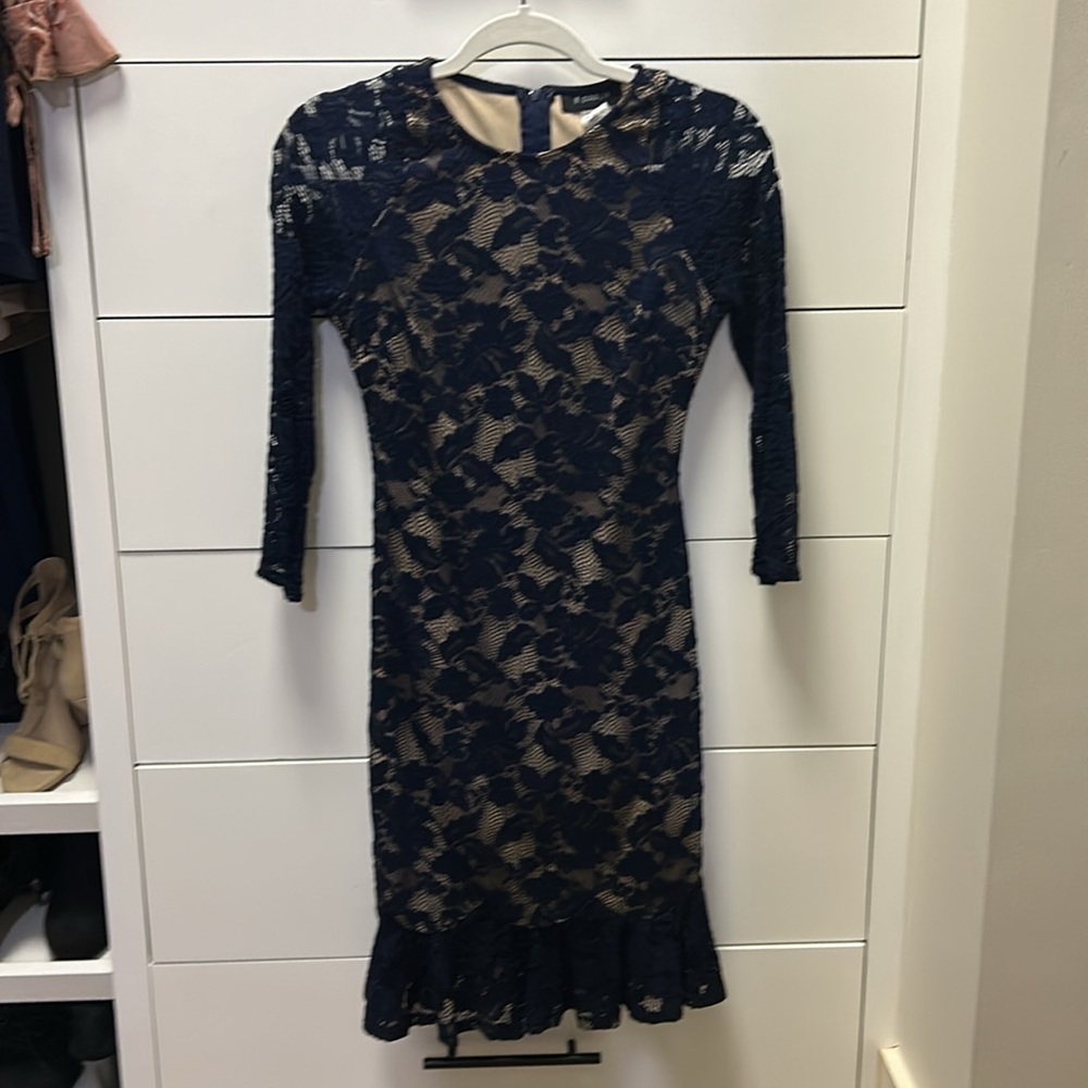 Navy lace dress with tan lining and ruffle bottom size 3/4